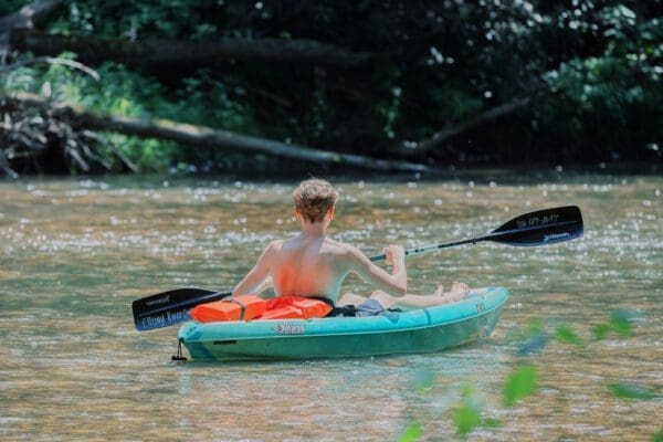 a family rafting and kayaking