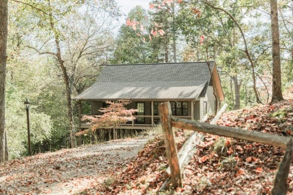 a cabin in the woods in fall