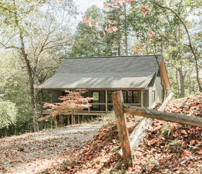 a cabin in the woods in fall